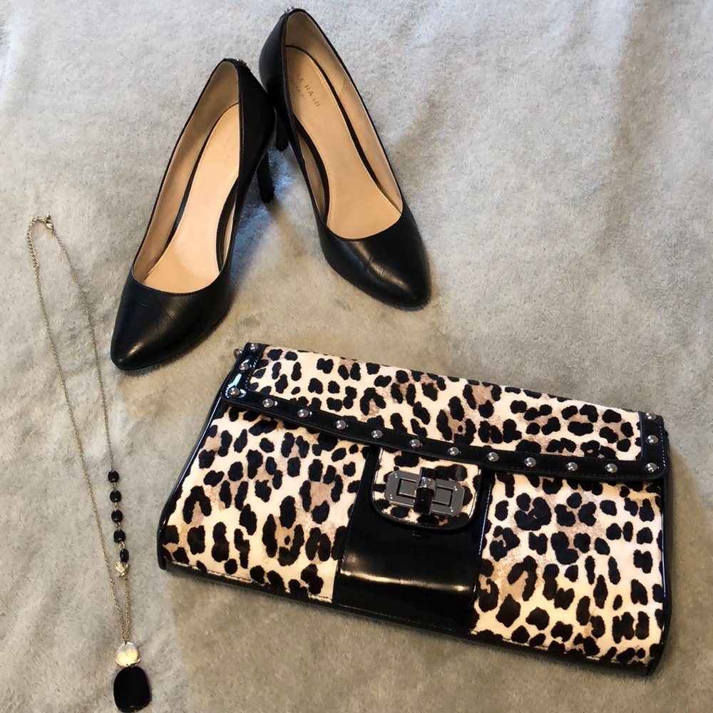 White House Black Market leopard clutch